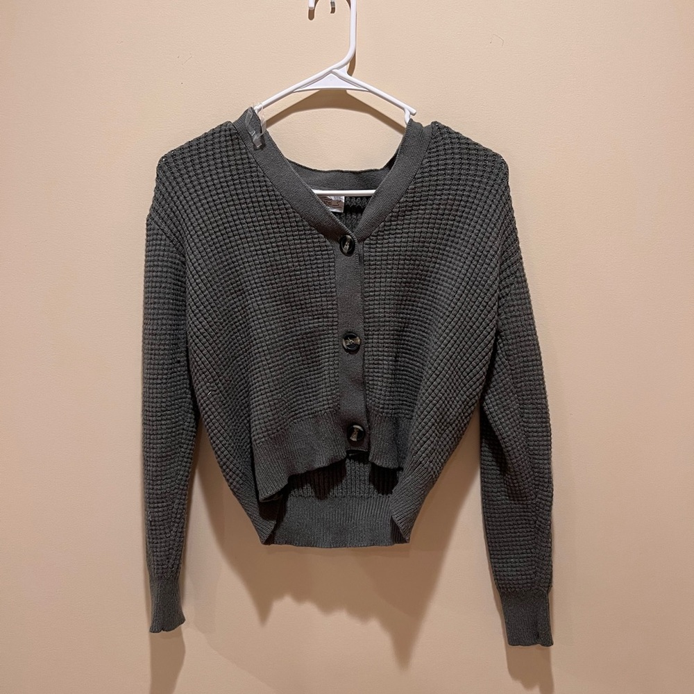 Dark green sweater. Super cute!